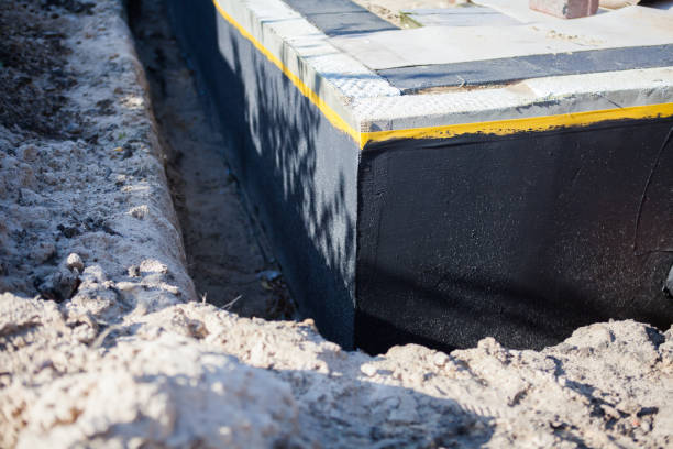 Professional Waterproofing technician working in Kendall Park, NJ
